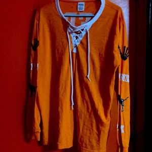 Victoria’s Secret orange shirt